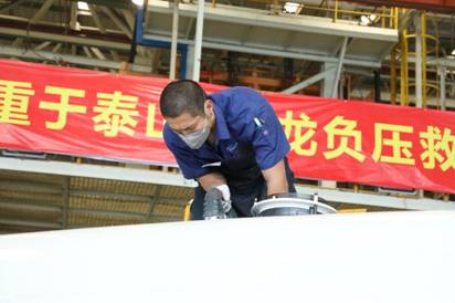 1589447256794200.jpg 負壓車生產彭志團4.jpg